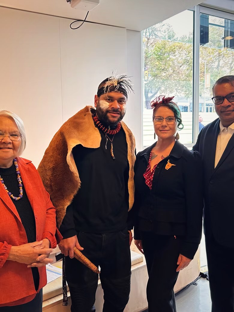 Petiola Wilson standing with Elders and guests following a ceremony